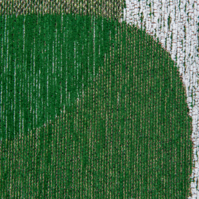 Groen tapijt met willekeurige, ronde vormen en een "Café" bonenmotief