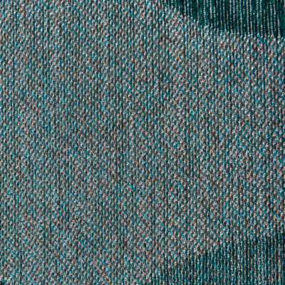 Groen en blauw tapijt met willekeurige, ronde vormen en een "Café" bonenmotief